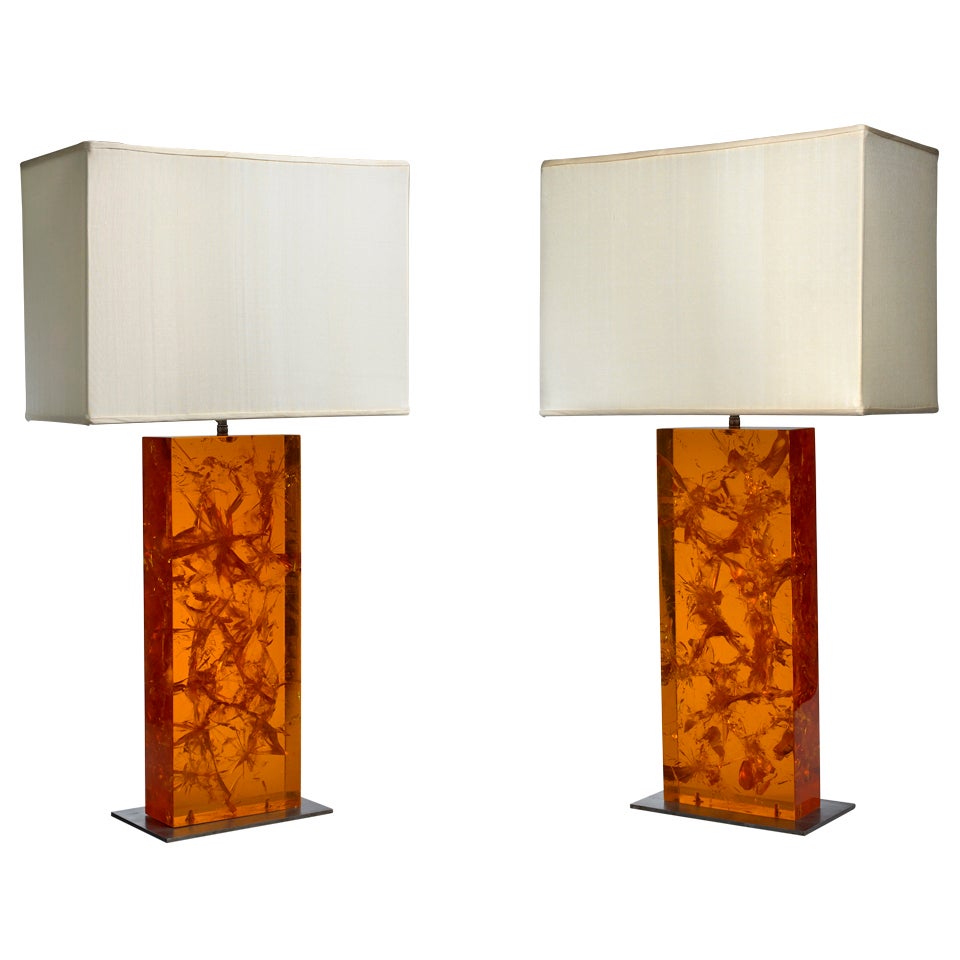 A Pair of Amber Lucite Lamps