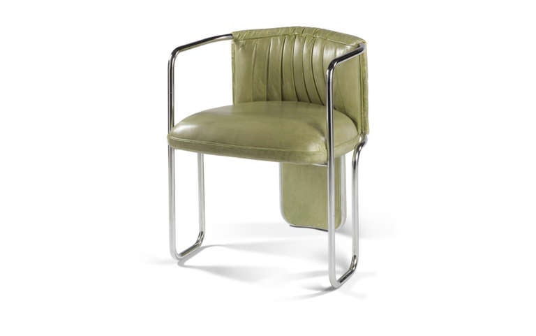 An Art Deco chrome tubular desk chair of unusual form upholstered in green leather.

France, circa 1930

Height: 26 in (66 cm)
Width: 21 ¾ in (55 cm)
Depth: 22 in (56 cm)

Seat height: 19in (48cm)