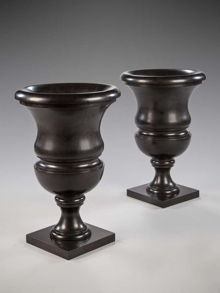 O3D0282

A magnificent pair of early 19th century, solid Ashford Black Marble vases of possibly unique scale. 

Whilst called a marble Ashford Black, ( or Derbyshire Black as it was sometimes known), is technically a limestone with a high