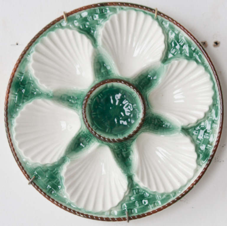 English oyster plates, colored and glazed in the early 1900's. Set of 7 for sale or sold individually. 
or $73.50 each