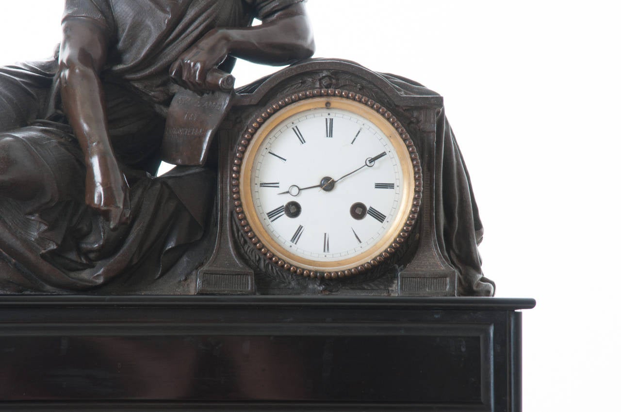 A fabulous French spelter figurative clock from the 19th Century. This fine quality piece features exquisite detail with a beautiful marble base. Would look wonderful on any mantel! See detailed photos of this exquisite mantel clock. c. 1880