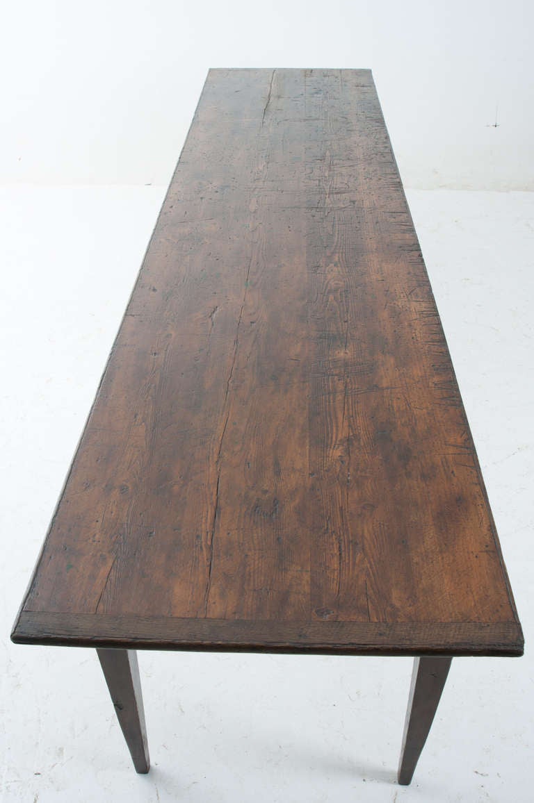 French 19th Century Dark Pine 10ft + Farm Table In Distressed Condition In Baton Rouge, LA