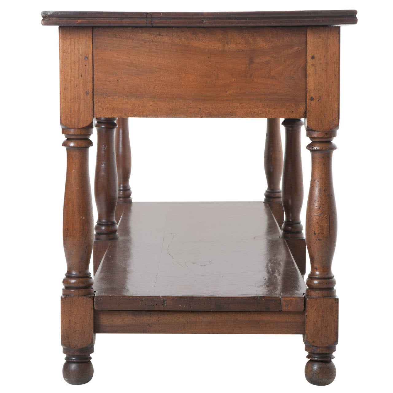 French gorgeous walnut, hand pegged drapers table. Drapers tables were used by a seamstress when laying out fabric for custom drapes. This Fine antique has a thick top and can lift off from its base. Two healthy drawers are on one side of the deep