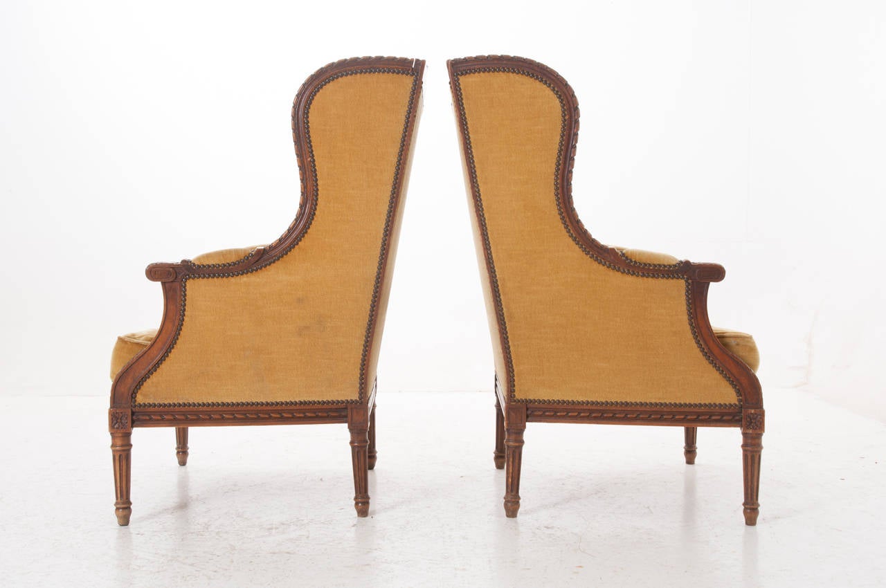 Pair of French 19th Century Carved Walnut Wingback Bergeres 4
