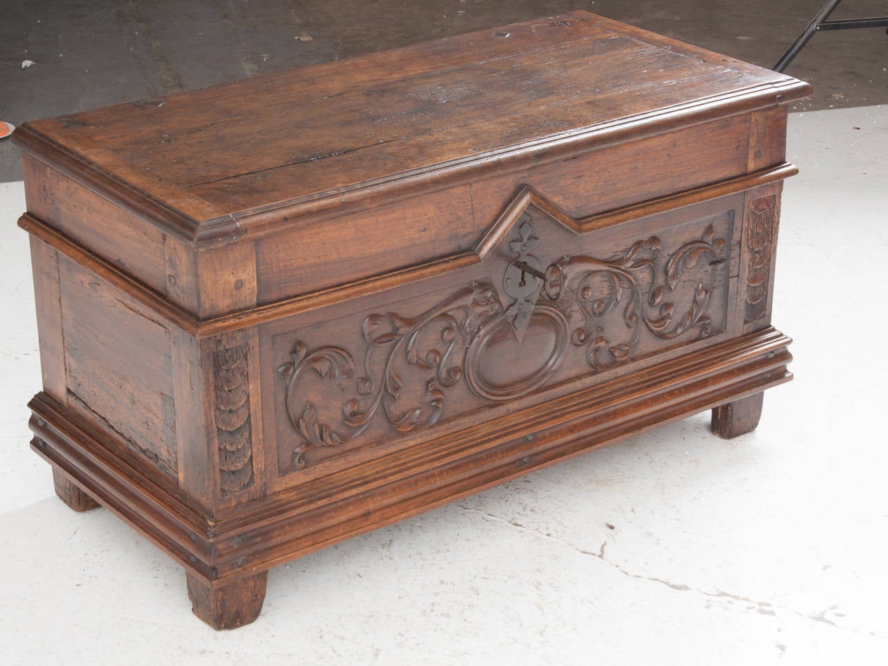 A darling, detailed and stunning carved wood coffer. You can see the detailed craftsmanship in all the carvings and handmade hinges! Hand pegged and made of solid wood, this fine coffer opens to generous storage. Keeping the original lock, we