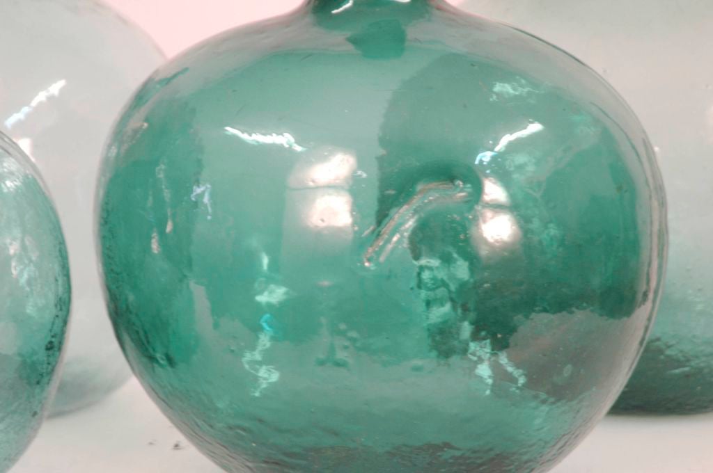 Turquoise 20th Century Italian glass wine and oil storage jars<br />
$95.00 to $195.00 EACH