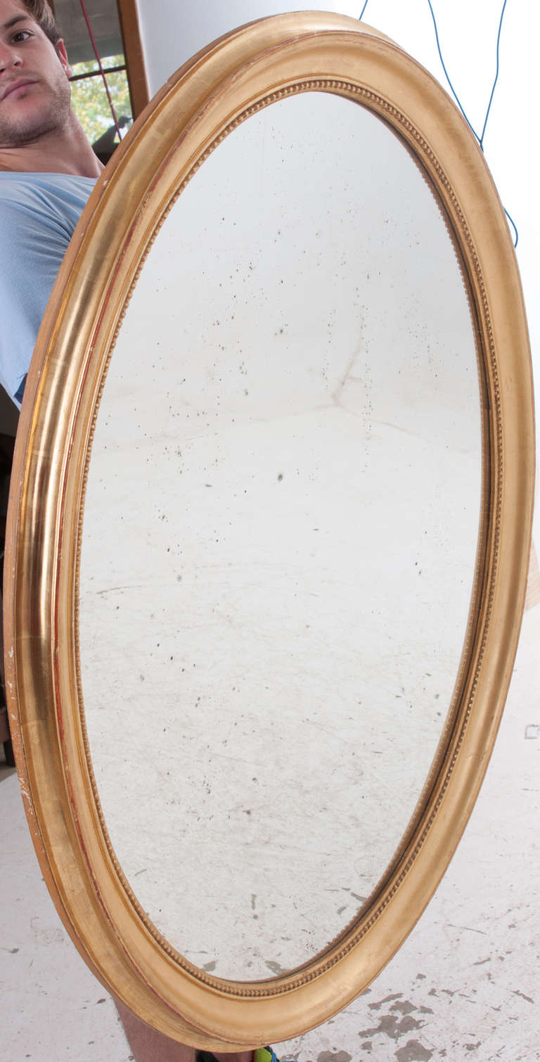 Large French 19th Century Gold Gilt Oval Mirror In Good Condition In Baton Rouge, LA