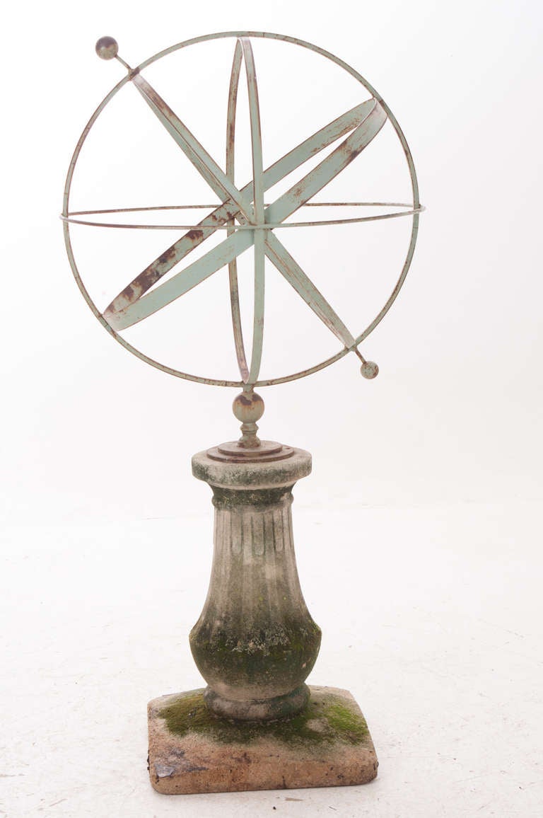 Painted metal armillary sphere of large scale from the 1900's on an older reconstituted stone base from the 19th Century. Wonderful way to tell the time. 
Thank you for your interest in our antiques. To view our full store online, visit