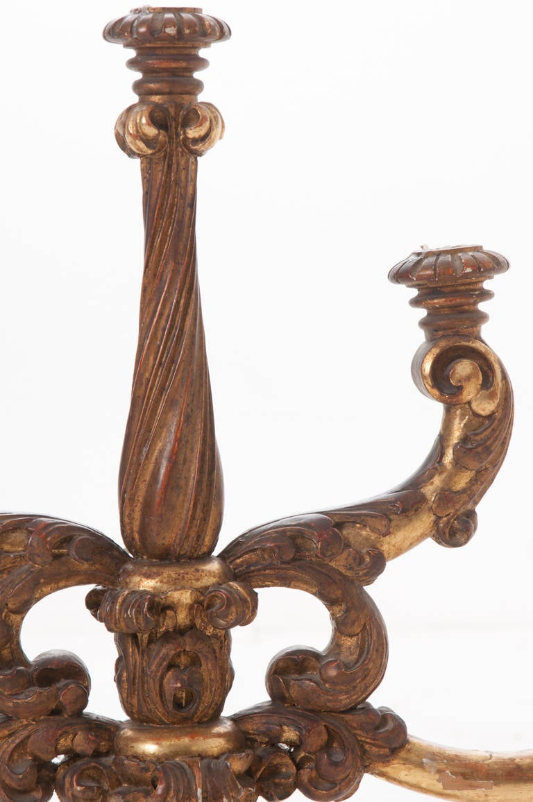 A stunning five arm candlestick from a church altar is hand carved and gold gilt, 1880's