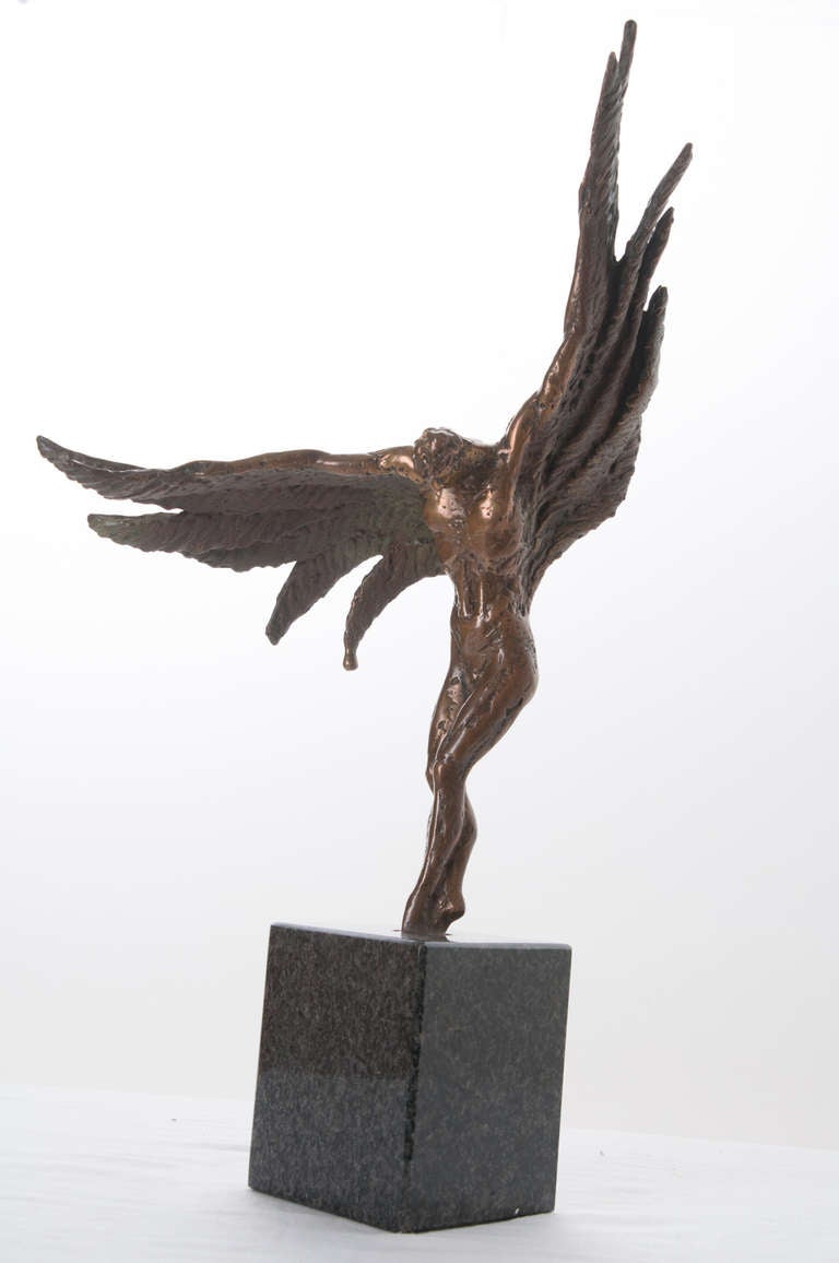 Italian bonze winged-man sculpture 'venturi art cera persa roldan' stamped on his backside. Stunning sculpture of this winged-man dating from around the middle of the 20th century. Sculpture sits on a square base of black granite. 
Granite base is: