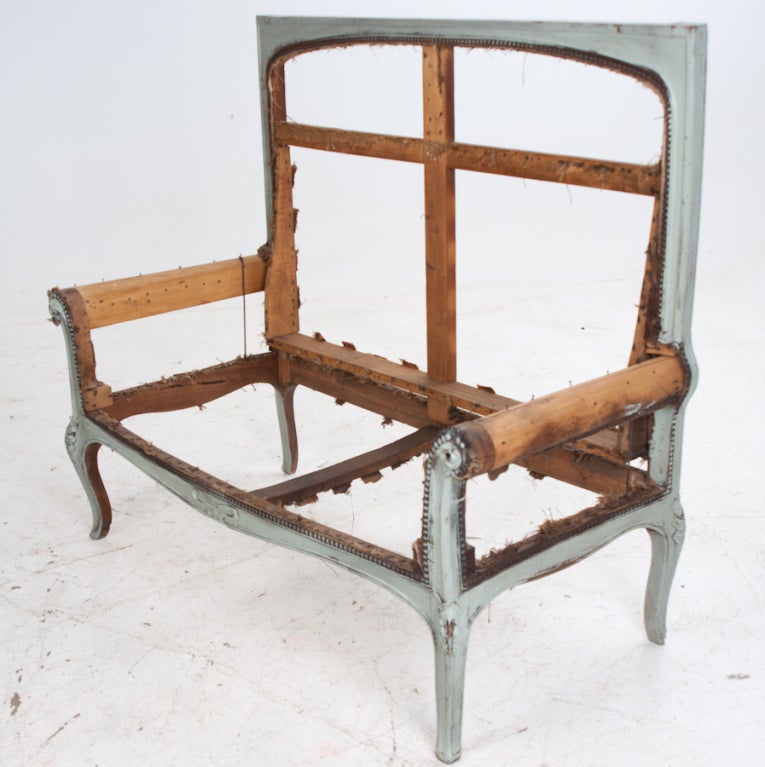 French high back banquette from the mid 1800's has been stripped down to it's frame. Leaving the buyer open to their personal fabric style and choice. The banquette has a walnut frame that has been painted blue long ago in France. It has a tall