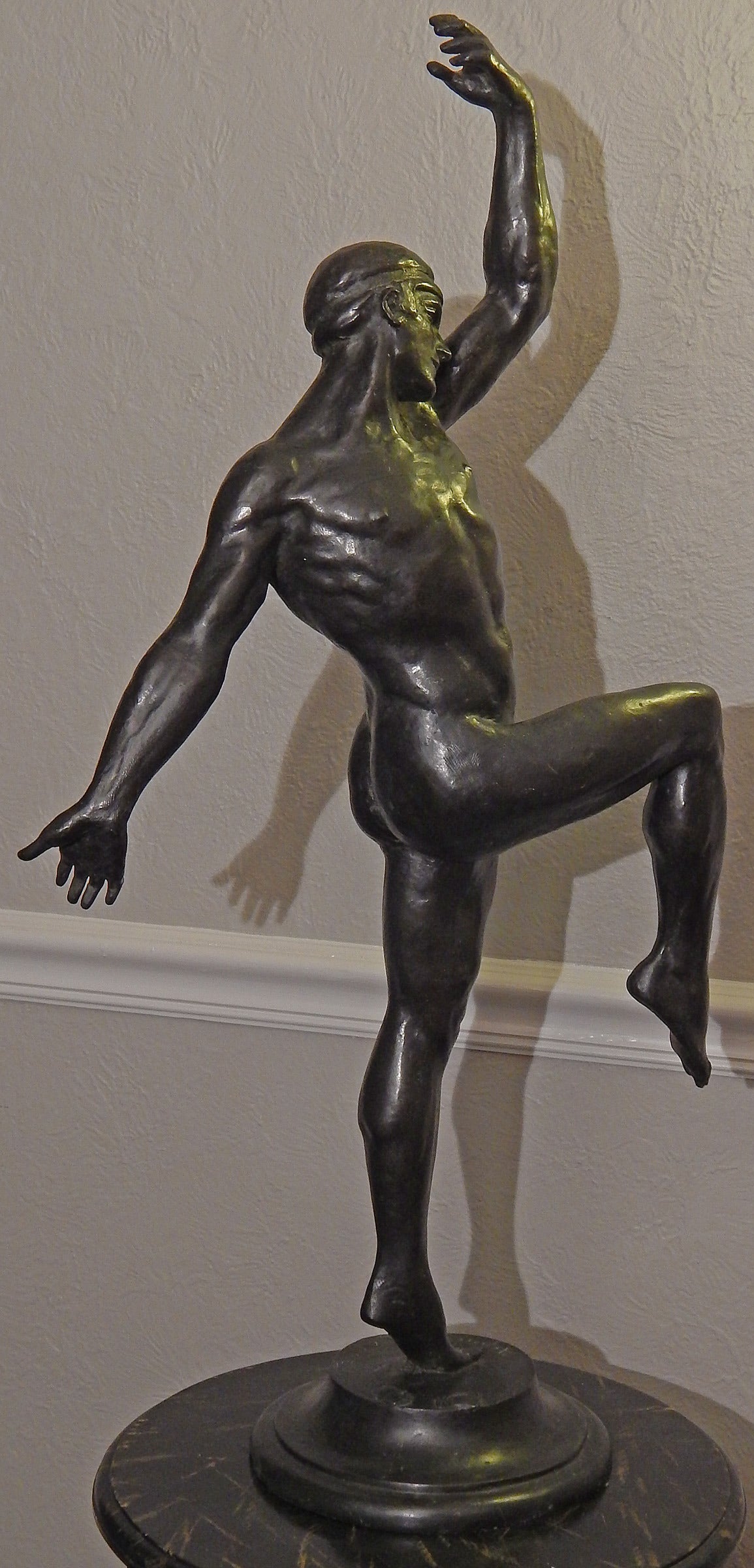 This especially large and rare bronze showing a modern male dancer in a dynamic pose was sculpted by Maurice Guiraud Riviere, one of France’s leading sculptors in the 1920s and 1930s. Riviere specialized in depicting figures posed in a stylized