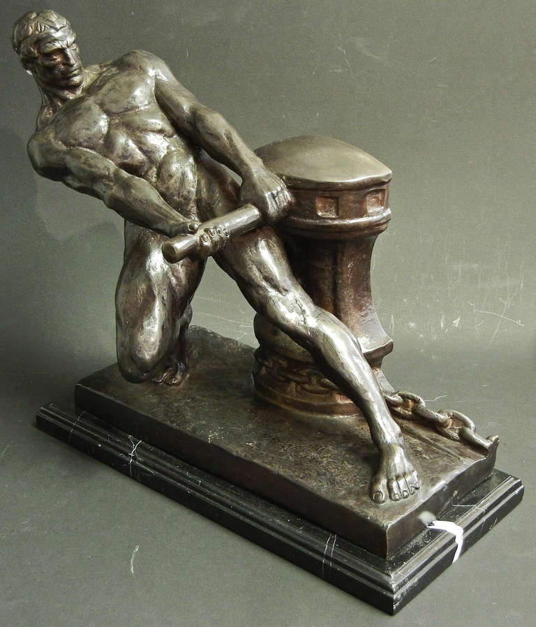 Very rare and substantial in size and subject matter, this bronze of a nude male shipman winding the winch that controls the lowering and raising of the anchor, was sculpted by Henri Bargas, a French sculptor partial to nude figures in motion.  This