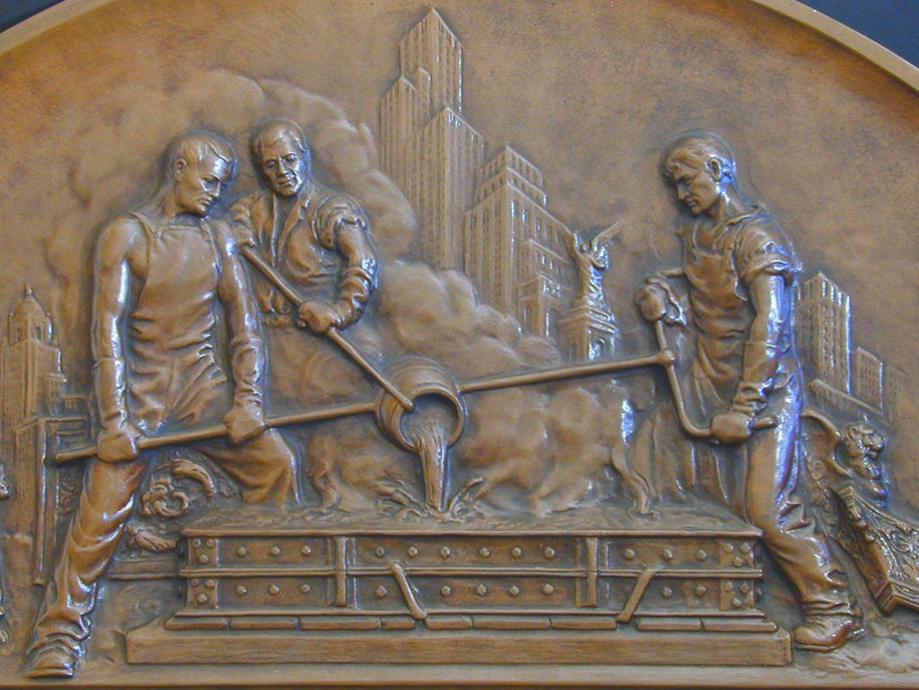 Beautifully sculpted and -- appropriately -- cast by the General Bronze Corporation to honor its retiring President in 1934, this handsome Art Deco panel depicts three workers pouring molten bronze into molds at its foundry.  Note a series of street