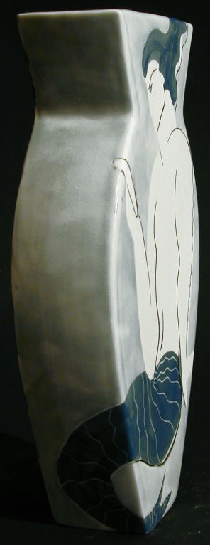 Sophisticated and economically designed, this charming vase depicts a mermaid (or possibly a merman) gazing into a hand mirror as tradition required.