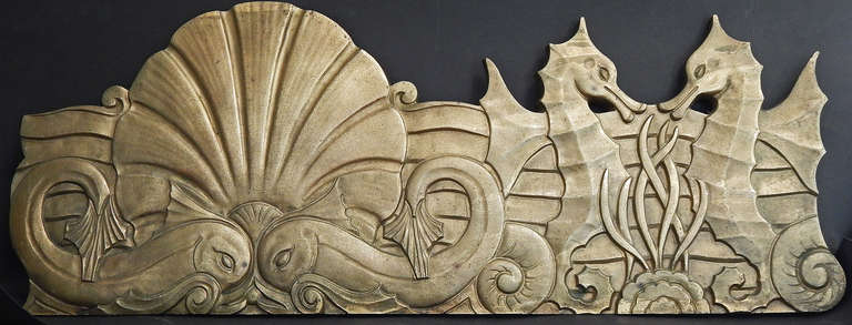This set of eight bronze Art Deco bas reliefs six frieze elements and two corner pieces originally served as the cornice for the ticket booth at a high-end New York theatre. The frieze has an elegant aquatic or undersea motif, complete with pairs of