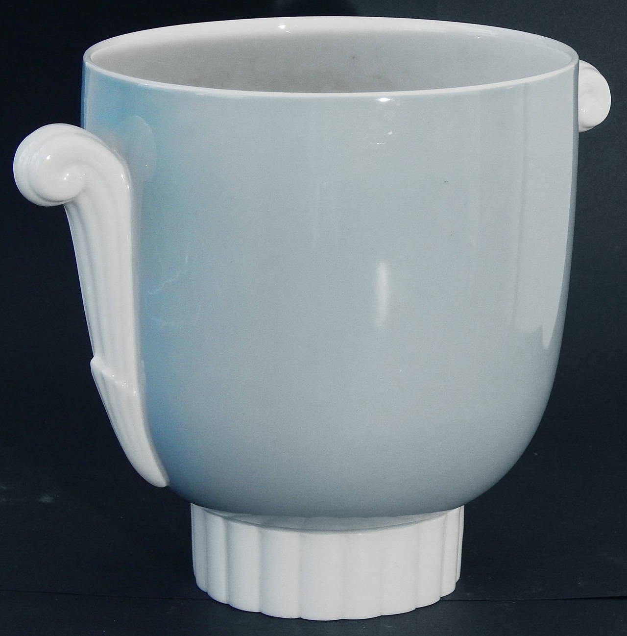 This highly rare and sophisticated Art Deco vase, gorgeously glazed in white and robin's egg blue, was made by the famed Lenox porcelain company in Trenton, New Jersey, for sale at the legendary Loring Andrews Company in Cincinnati, the city's
