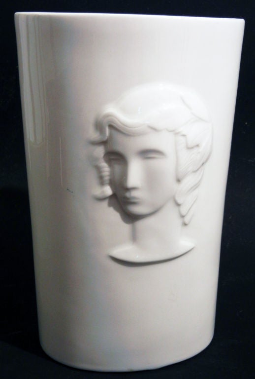 This very rare Art Deco porcelain vase was sculpted by a renowned ceramicist and painter -- Geza de Vegh -- and produced by Lamberton Scammell in Trenton, New Jersey.  The company commissioned de Vegh to sculpt a series of figurative pieces, all
