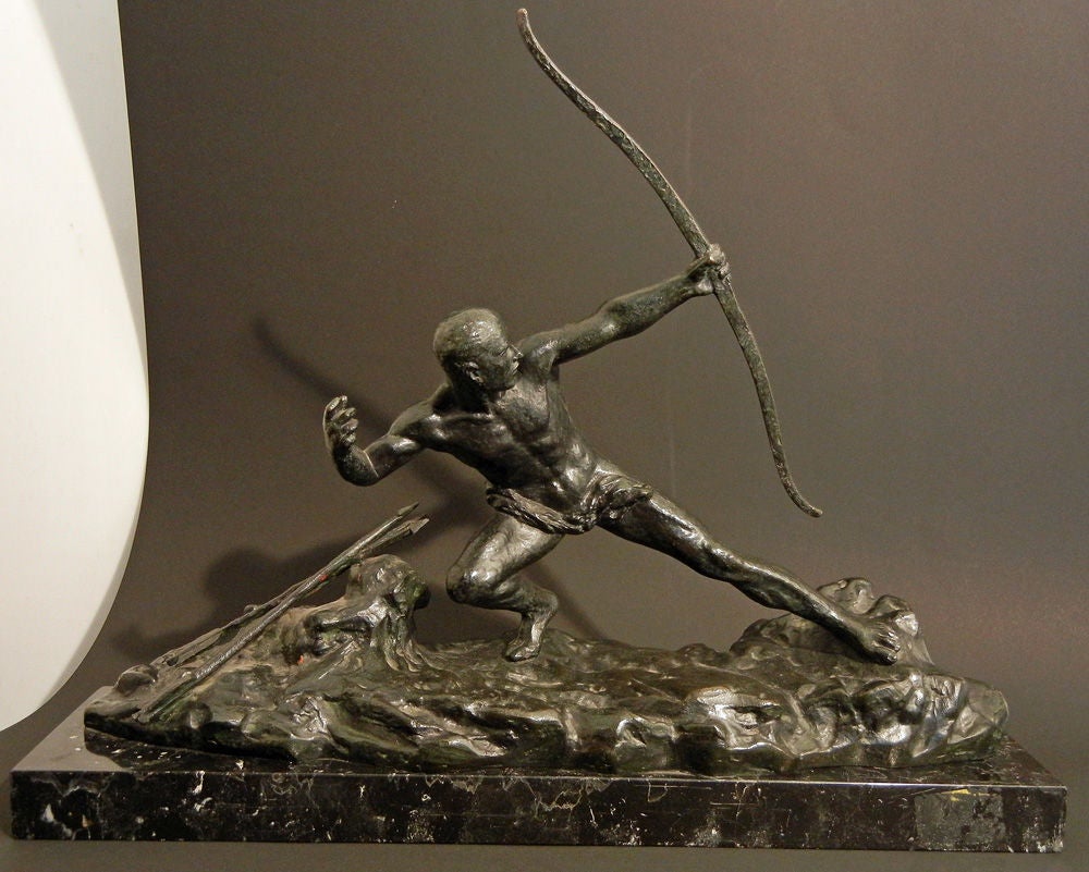 A very fine example of a tradition prompted by Antoine Bourdelle, where sculptors (Le Faguays and Ouline come to mind) captured strong male figures in feats of athletic prowess, or attempting an impossible physical labor, this Archer shows its hero