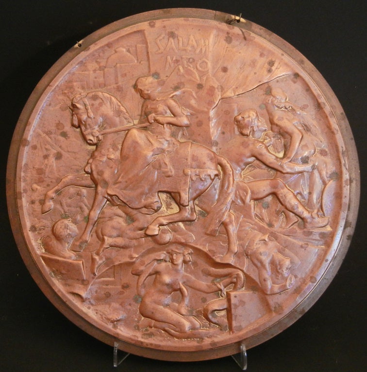 Cast in copper-patinated bronze and teeming with nude and semi-nude figures, this ambitious roundel refers to a number of legends and epics rooted in Egypt and Palestine.  Notice the nude figure of Cleopatra being bitten by an asp in the lower