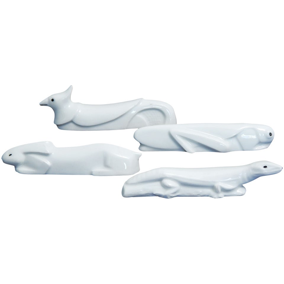 Juego de nueve inusuales apoyacuchillos Art Decó de porcelana, Francia en venta