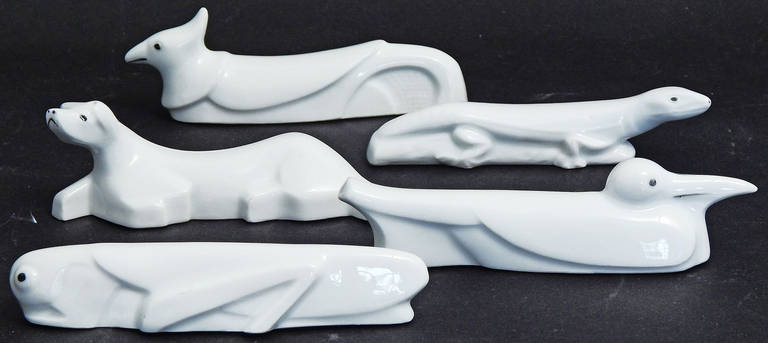 Juego de nueve inusuales apoyacuchillos Art Decó de porcelana, Francia Francés en venta
