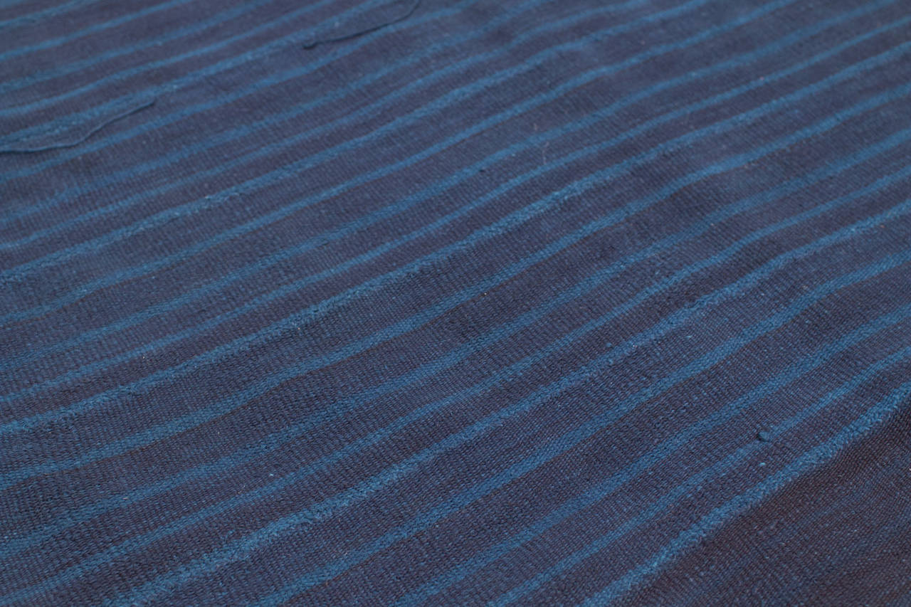 A beautiful Indigo dyed stripe fabric from west Africa, perhaps Ivory Coast.