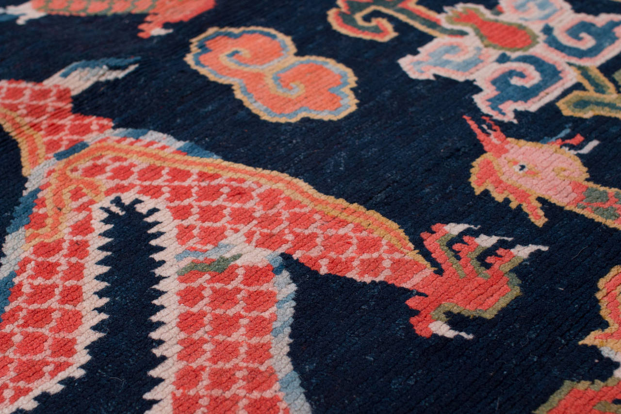 A beautiful antique Tibetan rug with lustrous silky wool and brilliant indigo and vegetable dyes.