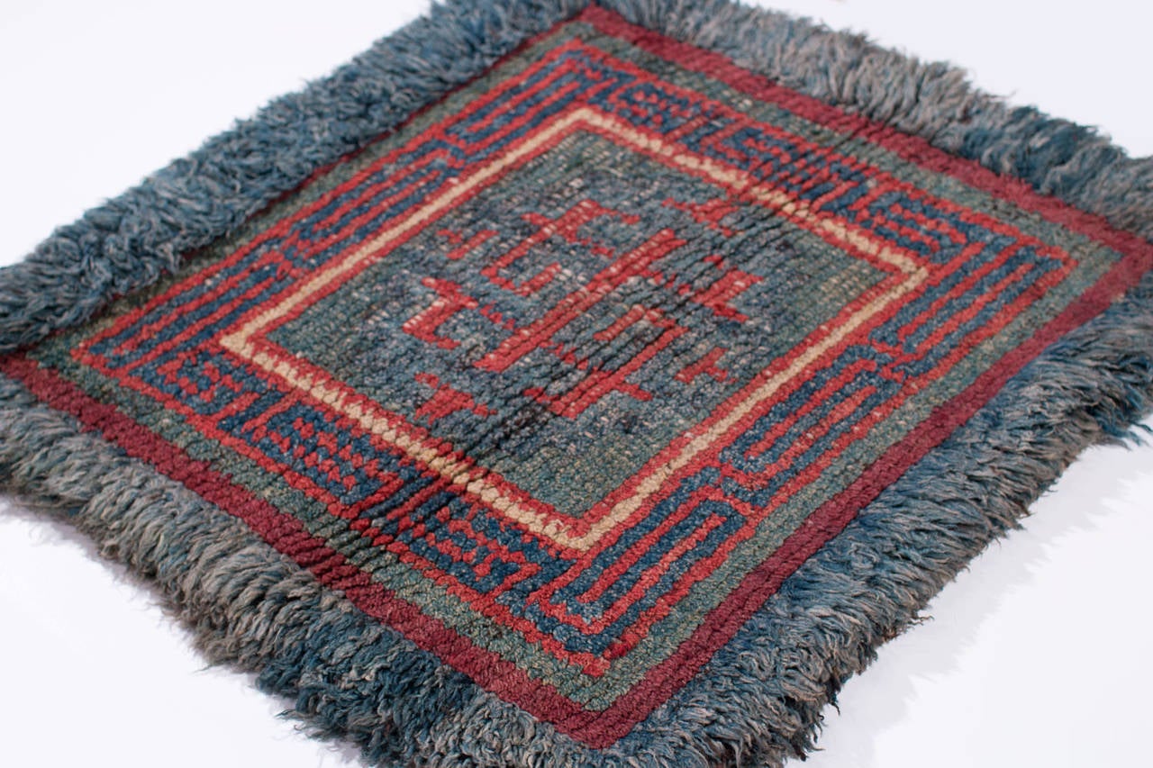 An old meditation rug from a Tibetan monastery. All natural dyes and beautiful wool.