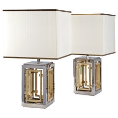 A Pair of Silvered and Brass Lamps by Romeo Rega
