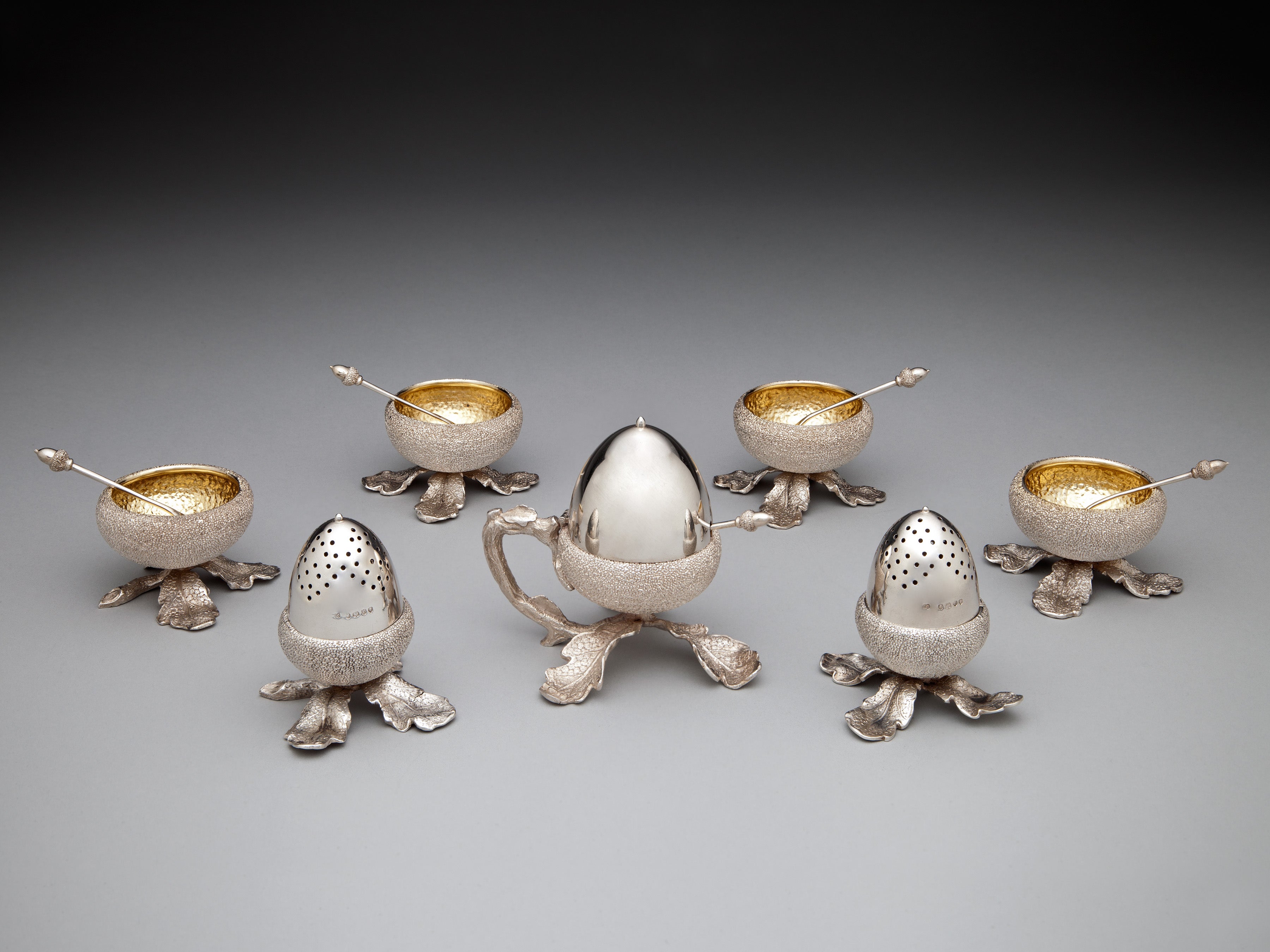 An Oak Leaf Silver Condiment Set by Alexander Crichton