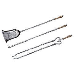 A Set Of Fire Irons With Barley Twist Shafts