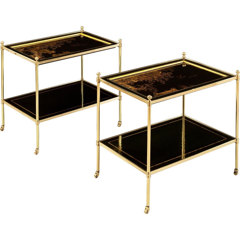 A Pair Of Black Lacquer Two Tier Tables
