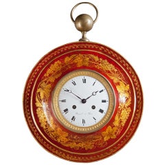 A Charles X Red Tole Cartel Clock
