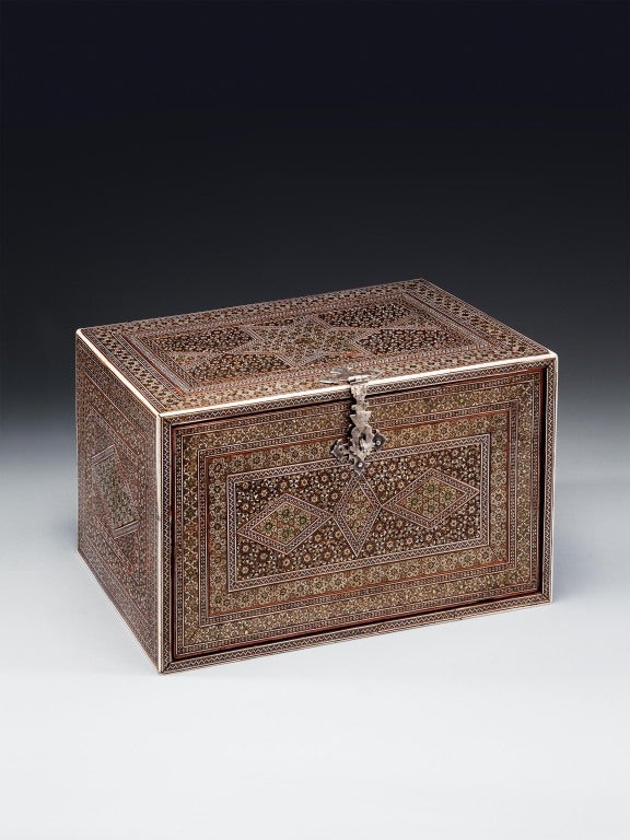 A fine early 19th century fall-front box inlaid in sadeli-ware, the intricate decoration a geometric micromosaic of ivory, green-stained ivory, tin, horn, ebony and sappan wood, the front revealing six drawers with further panels of sadeli work, all