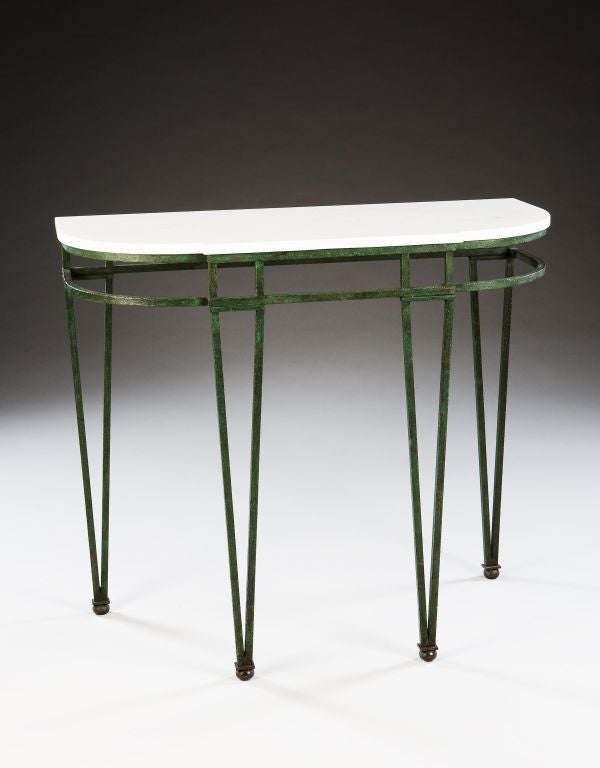 A Pair Of Painted Iron Consoles