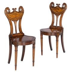 A Pair Of Regency Period Mahogany Hall Chairs