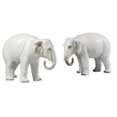 A Pair Of Porcelain Elephants