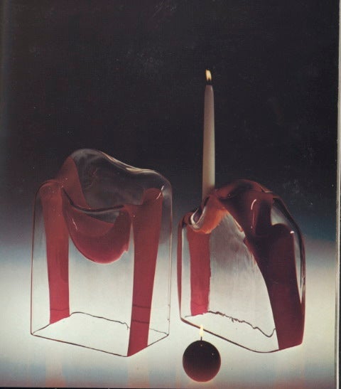 designed by Carl Nason for Mazzega, c. 1974,
clear and orange red freeform glass sculpture. The model is illustrated in 1970s advert (pictured with candle).