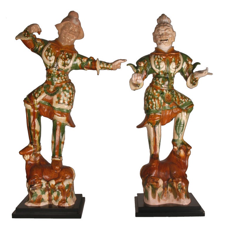 Pair of large Chinese sancai-glazed earthenware figures of Lokopala (T'ien-wang). These two Lokapala represent two of the four Guardian Kings, who in Buddhist thought are believed to protect the four cardinal points. Believed to dwell on Mount Meru