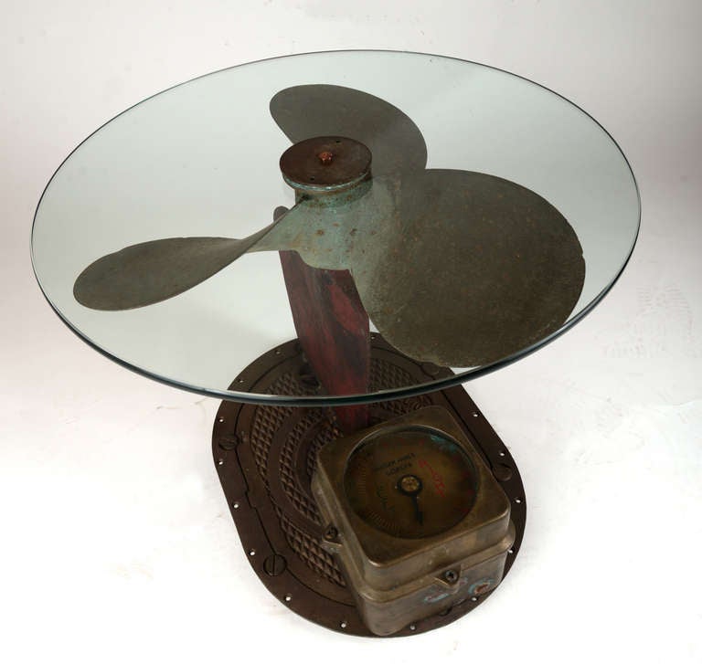 A brass propellor, a rudder gauge under glass and within a cast brass housing, a steel rudder fragment and a cast bronze porthole were gathered by a retired maritime engineer in Bellingham, Washington, who had a vision:  he brought these elements