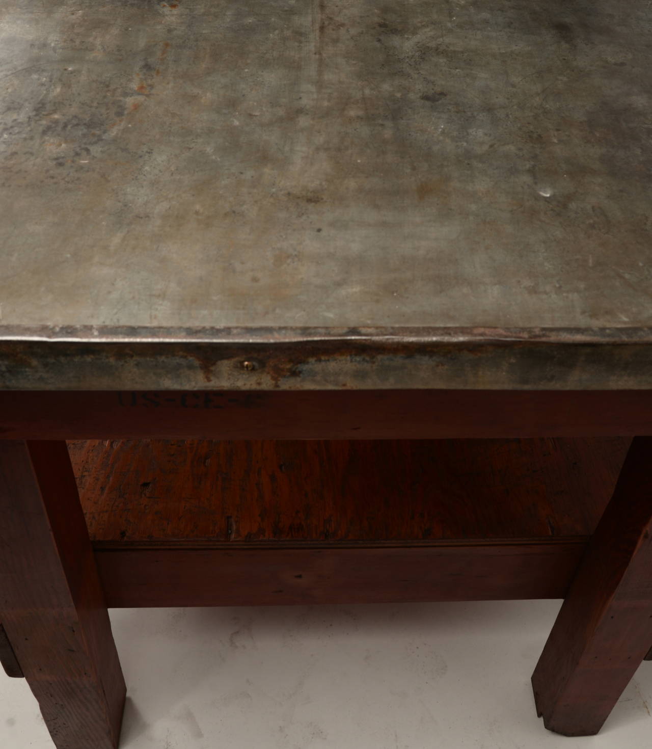 Vintage army corps of engineers table. The base is old growth Douglas fir and the top is galvanized steel the has a wonderful patina. This has been thoroughly cleaned and waxed.