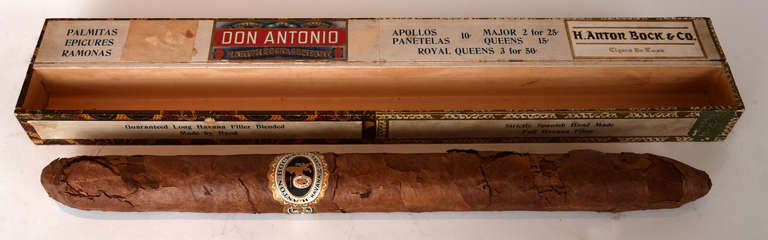 For the cigar aficionado in your life, the piece will surely impress.  In its original box and with all original labeling.   Anton Bock & Company.  Rare.