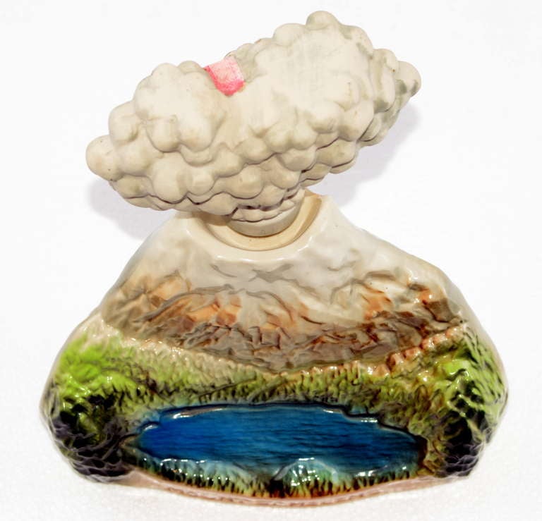 We all remember the day - here out west, especially so.  The people at Jim Beam do too.  To wit:  this commemorative whiskey decanter is collectible and colorful.  Look closer:   Spirit Lake in the foreground, the Gifford Pinchot National Forest in 