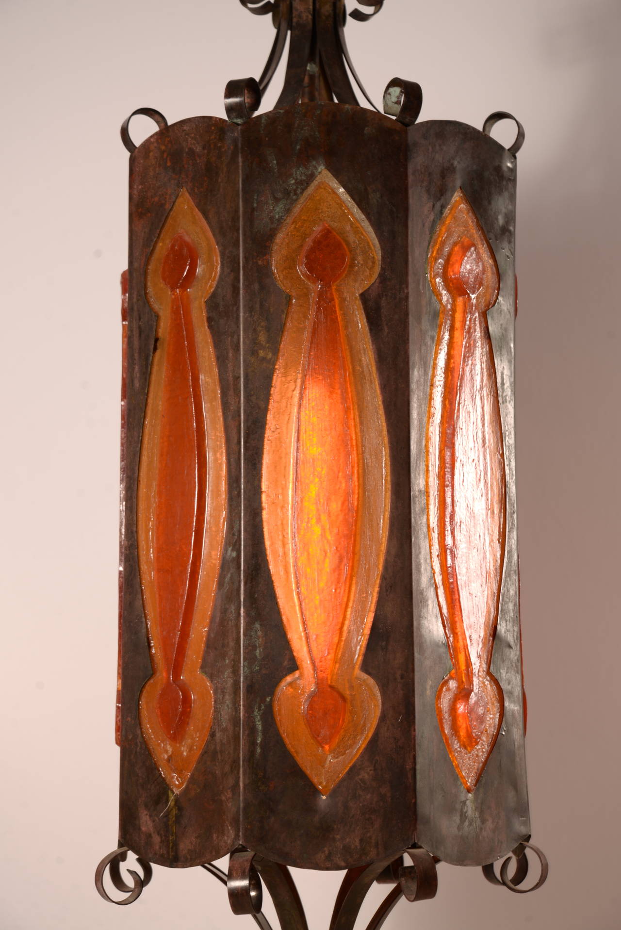 Large scale copper plated pendant with dual colored resin inset panels.