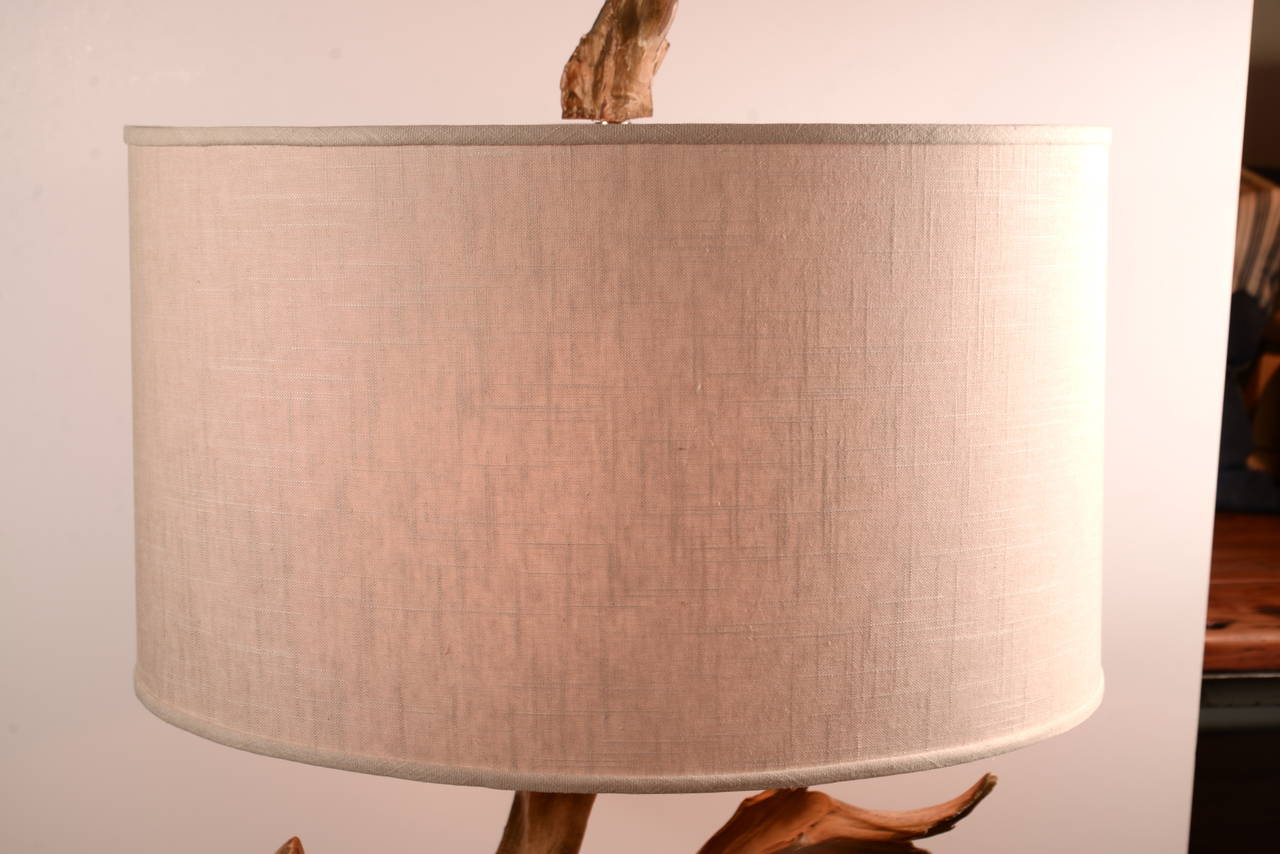 Oh, what a great lamp can do for a room!  The large scale, sculptural form, soft color and original hand-stitched shade bring this well-made piece to life.