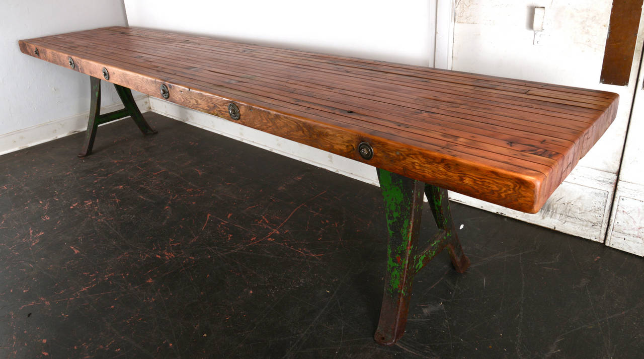 This amazingly substantial through bolted work table came from the Oregon coast and dates from, circa 1910. This would work beautifully as a dining table or an anchor piece for any stunning commercial or residential interior.