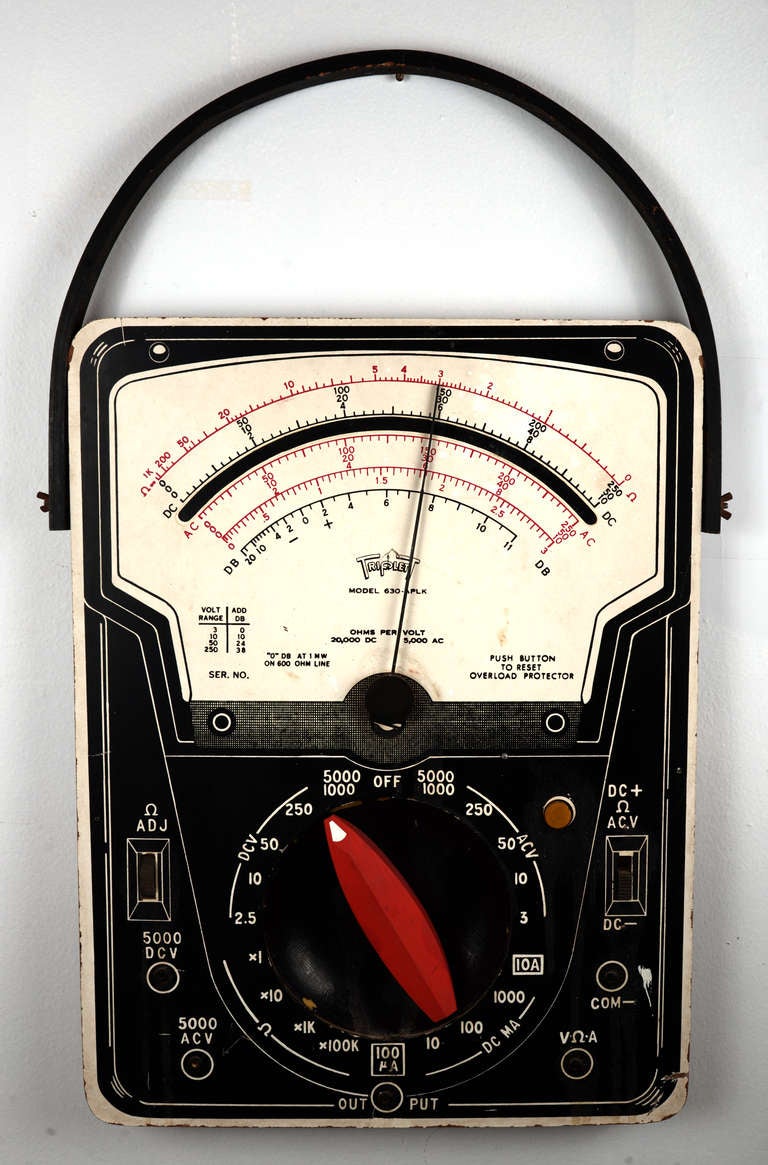 Large-scale painted plywood demonstrator/training device by the Triplett Company, the maker of voltmeters and other specialty electrical testing devices.  This is the analog voltmeter, Model 630APLK.  But, of course.

Carved switches and faux