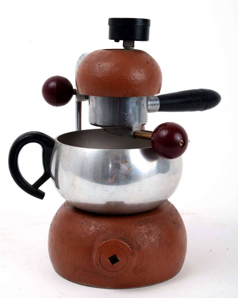 The 'Atomic' Espresso Maker is a glorious creation in the heyday of Italian design:  made during the same era that produced the Olivetti typewriter, the Vespa scooter and Pininfarina-designed automobiles.   Like other products of the Organic Design