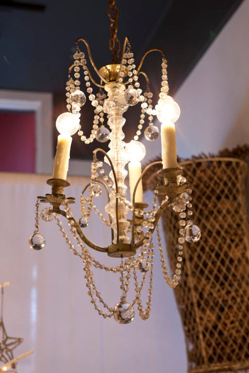 one of the sweetest chandeliers i have ever found... truly special. <br />
professionally rewired and cleaned.<br />
<br />
photo john granen